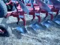Traktor + 40 pługów