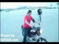 Motorcyclist makes an ass of himself