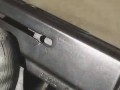 Pistolet maszynowy w zwolnionym tempie
