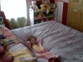 Dad bounces girl off bed