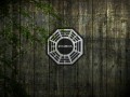 Tapeta - Logo dharma na płocie