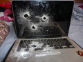 Laptop po strzałach