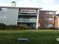 Wynoszenie kanapy przez balkon